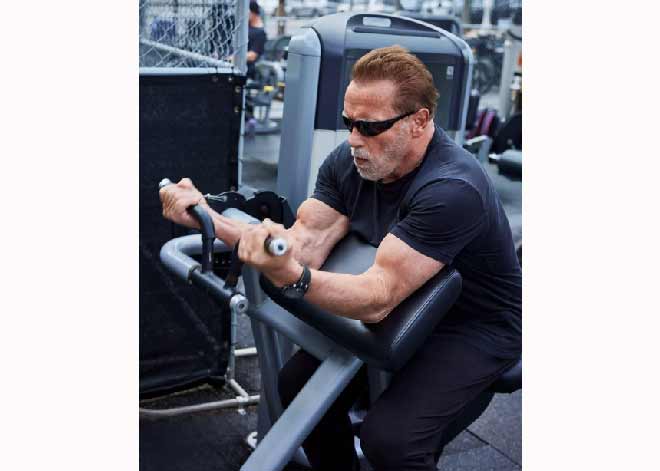 Hollywood actor Arnold Schwarzenegger pumps iron, flaunts strength