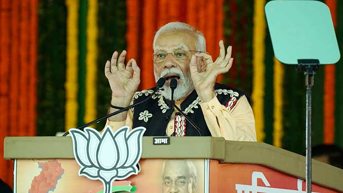 PM Modi accuses Congress of looting the resources of tribals - The