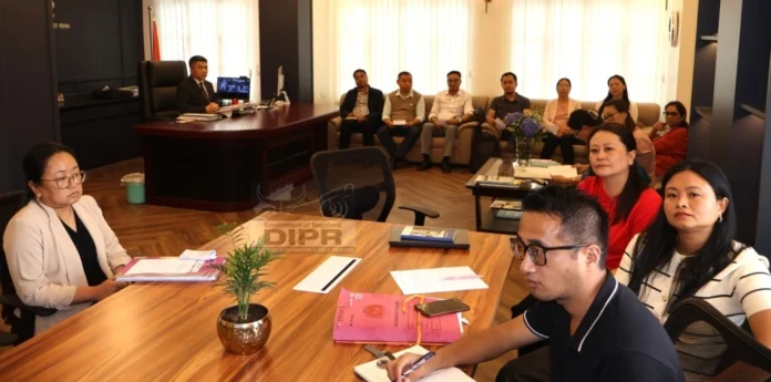 B. Henok Buchem, with other officials during District Task Force meeting_result