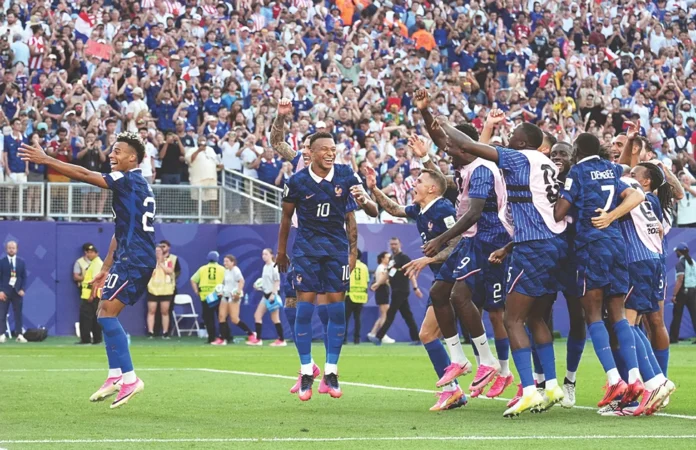 FIFA WC_Mbappe penalty takes France past Paraguay into quarterfinals_result