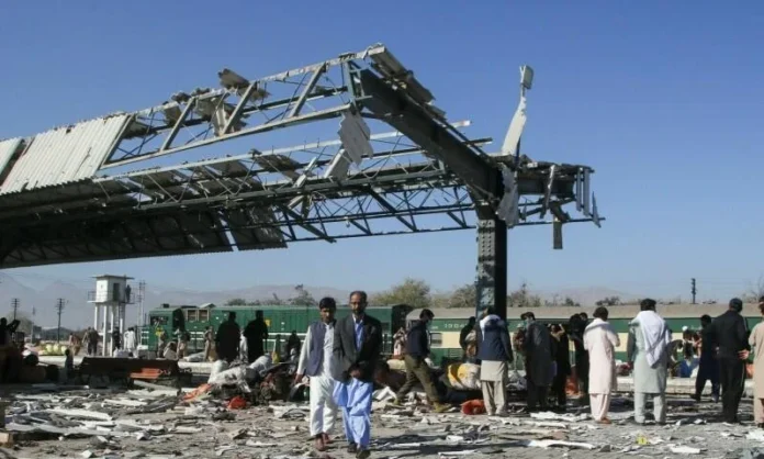 Security personnel inspect the damaged Khazina Banda police checkpost_result