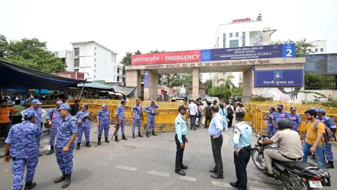 Security personnel stand outside Safdarjung Hospital after Activist Sonam Wangchuk was taken to hospital in New Delhi._result