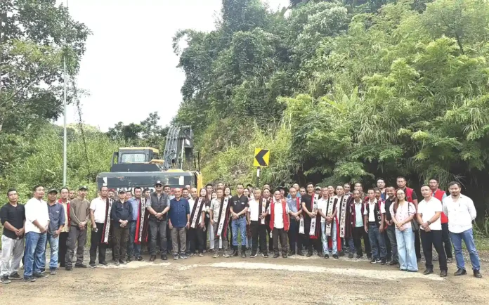 Officials and others after a prayer programme at Dikhu Bridge.